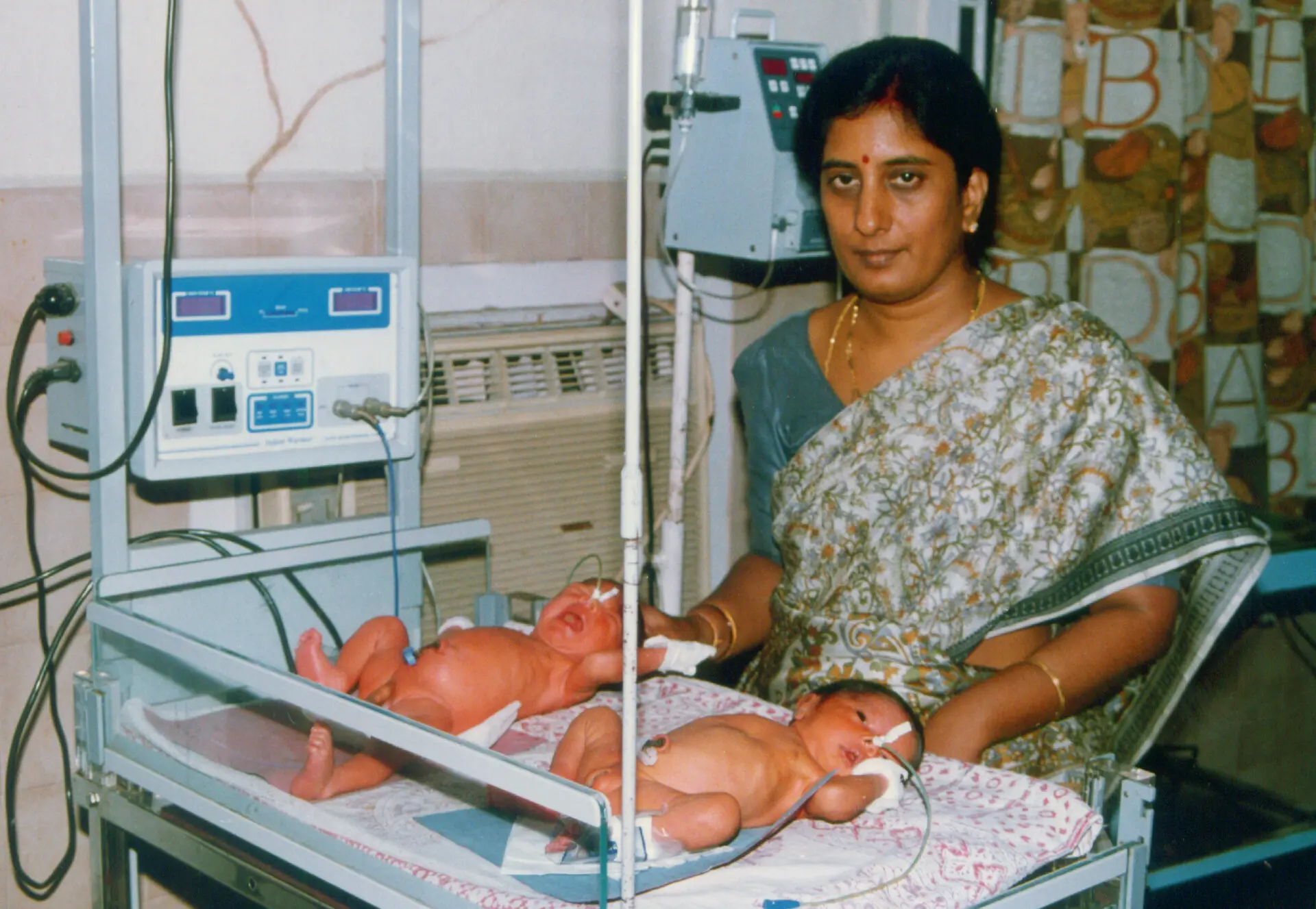 Dr. Rama devi Kolli with the first twins born after Testicular Extraction of Sperm (TESA) procedure and ICSI in entire coastal Andhra Pradesh, done at our clinic in 2001